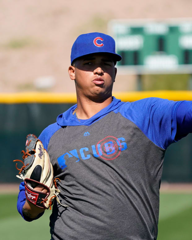 Feb 25, 2020; Mesa, Arizona, USA; Chicago Cubs pitcher Brailyn Marquez warms up during a spring training camp at Sloan Park.