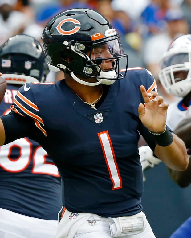 Aug 21, 2021; Chicago, Illinois, USA; Chicago Bears quarterback Justin Fields (1) looks to pass the ball against the Buffalo Bills during the second half at Soldier Field.