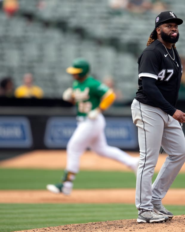 Sep 11, 2022; Oakland, California, USA; Chicago White Sox starting pitcher Johnny Cueto (47) waits while Oakland Athletics outfielder Ram n Laureano (22) runs out his two-run home run during the fifth inning at RingCentral Coliseum.