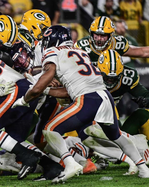 Sep 18, 2022; Green Bay, Wisconsin, USA; Chicago Bears quarterback Justin Fields (1) is stopped short of the goal line in the fourth quarter during game against the Green Bay Packers at Lambeau Field.