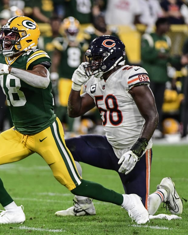 Sep 18, 2022; Green Bay, Wisconsin, USA; Green Bay Packers wide receiver Randall Cobb (18) reacts after catching a pass against Chicago Bears linebacker Roquan Smith (58) for a first down in the second quarter at Lambeau Field.
