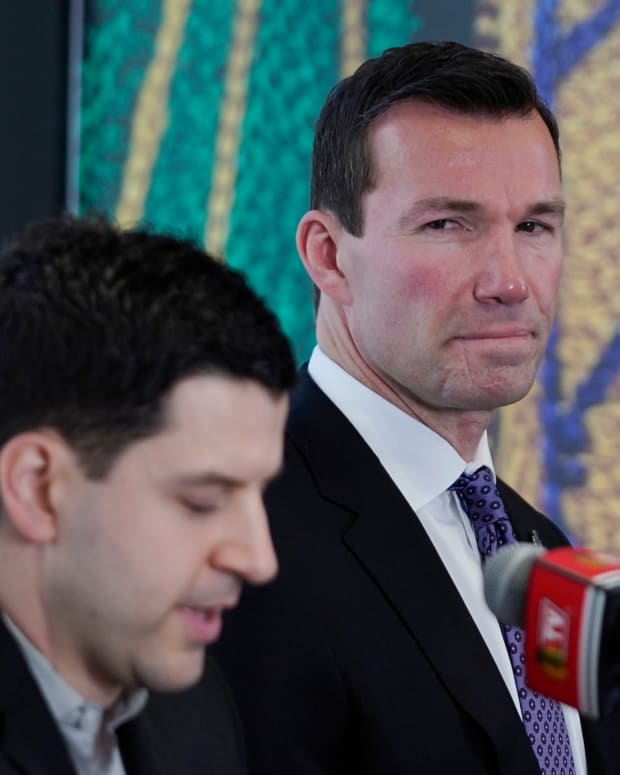 Jun 29, 2022; Chicago, IL, USA; Chicago Blackhawks new head coach Luke Richardson (right) is introduced by Hawks general manager Kyle Davidson, (left) at a press conference at the Chicago Blackhawks Store.