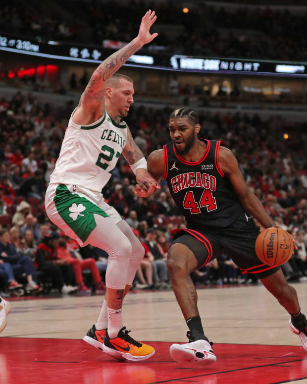 Apr 6, 2022; Chicago, Illinois, USA; Chicago Bulls forward Patrick Williams (44) drives against Boston Celtics center Daniel Theis (27) during the second half at the United Center.