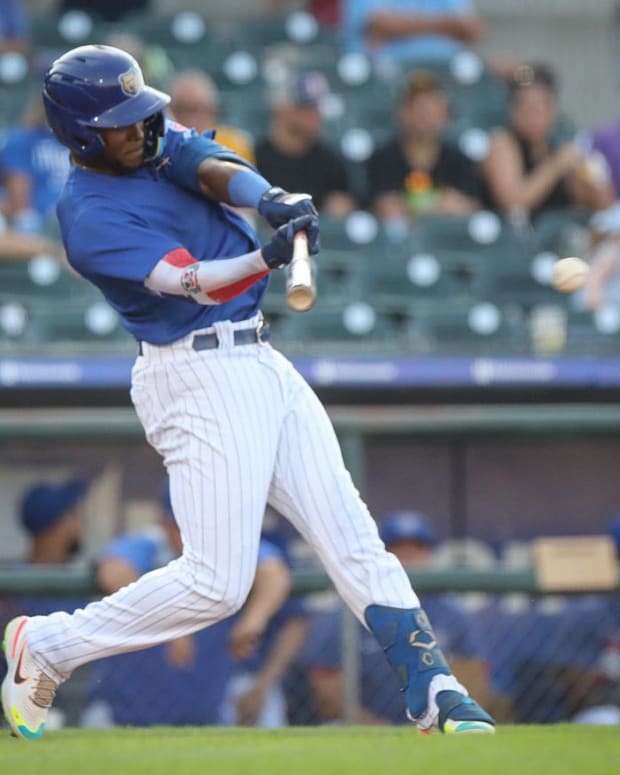 Chicago Cubs' prospect Alexander Canario swings at a pitch