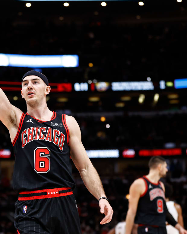 Jan 19, 2022; Chicago, Illinois, USA; Chicago Bulls guard Alex Caruso (6) reacts during the second half of NBA game against the Cleveland Cavaliers at United Center.