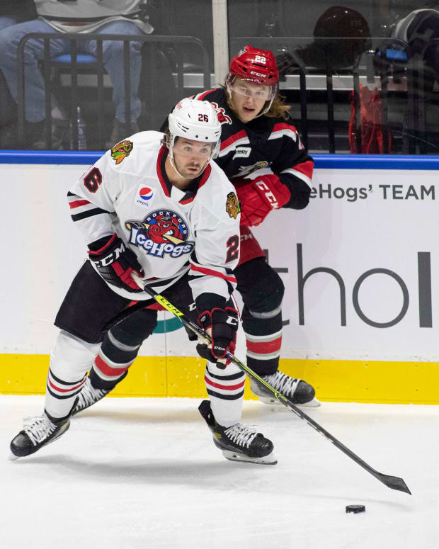 IceHogs Evan Barratt takes the puck against the Grand Rapid Griffins at BMO Harris Bank Center on Saturday, Nov. 6, 2021, in Rockford.