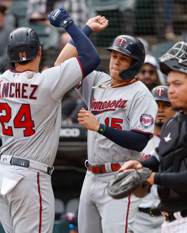Oct 5, 2022; Chicago, Illinois, USA; Minnesota Twins catcher Gary Sanchez (24) celebrates with third baseman Gio Urshela (15) after hitting a three-run home run against the Chicago White Sox during the first inning at Guaranteed Rate Field.
