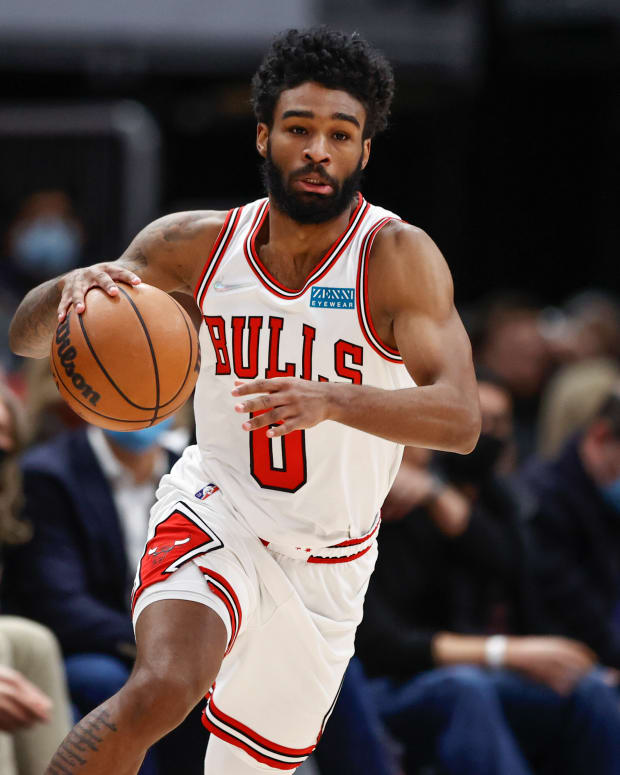 Jan 26, 2022; Chicago, Illinois, USA; Chicago Bulls guard Coby White (0) drives to the basket against the Toronto Raptors during the second half at United Center.