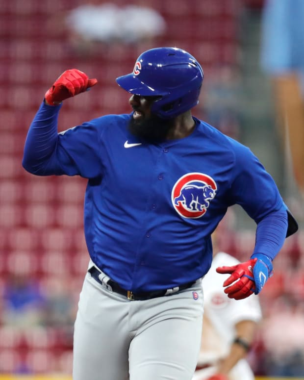 Oct 5, 2022; Cincinnati, Ohio, USA; Chicago Cubs designated hitter Franmil Reyes (32) reacts as he runs the bases after hitting a two-run home run against the Cincinnati Reds during the eighth inning at Great American Ball Park.