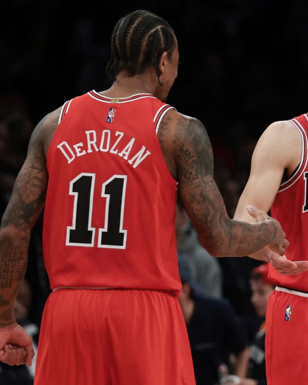 Dec 4, 2021; Brooklyn, New York, USA; (Editors Notes: Caption Correction) Chicago Bulls forward DeMar DeRozan (11) and guard Zach LaVine (8) celebrate after defeating the Brooklyn Nets at Barclays Center.