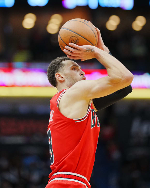 Nov 16, 2022; New Orleans, Louisiana, USA; Chicago Bulls guard Zach LaVine (8) shoots a three point shot against the New Orleans Pelicans during the fourth quarter at Smoothie King Center.