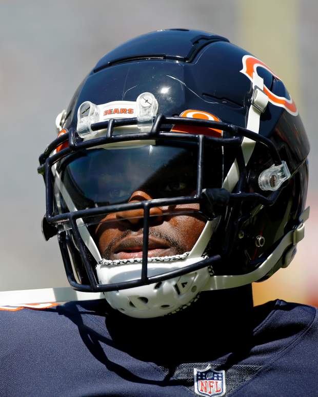 Aug 14, 2021; Chicago, Illinois, USA; Chicago Bears cornerback Jaylon Johnson (33) walks on the field during warmups before the game against the Miami Dolphins at Soldier Field.