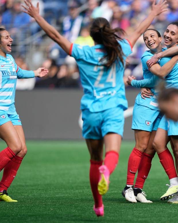 Apr 21, 2024; Seattle, Washington, USA; Chicago Red Stars forward Mallory Swanson (9) celebrates with teammates after scoring a goal against Seattle Reign FC during the first half at Lumen Field. Mandatory Credit: Stephen Brashear-USA TODAY Sports