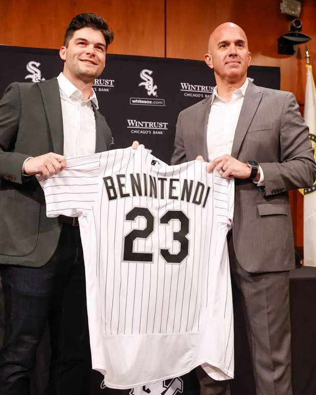 Jan 4, 2023; Chicago, Illinois, USA; Chicago White Sox manager Pedro Grifol (right) poses with free-agent outfielder Andrew Benintendi (left) during a press conference at Guaranteed Rate Field.