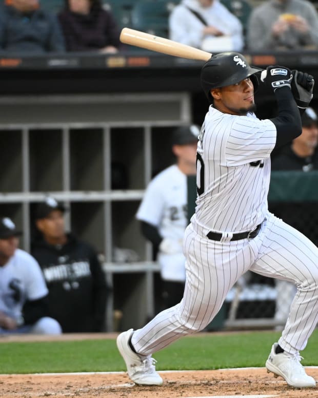 Apr 27, 2023; Chicago, Illinois, USA; Chicago White Sox second baseman Lenyn Sosa (50) hits an RBI double against the Tampa Bay Rays during the second inning at Guaranteed Rate Field.