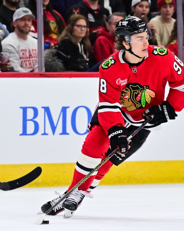 Feb 5, 2025; Chicago, Illinois, USA; Chicago Blackhawks center Connor Bedard (98) skates with the puck against the Edmonton Oilers during the second period at the United Center.