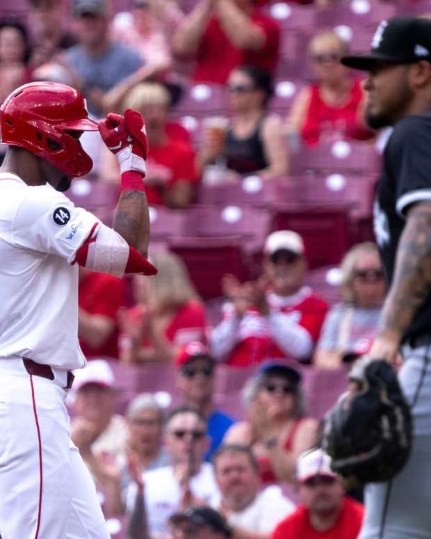 Cincinnati Reds outfielder Will Benson (30) gestures after reaching first on a 2-run RBI single in the first inning of the MLB game between Cincinnati Reds and Chicago White Sox at Great American Ball Park in Cincinnati on Thursday, May 15, 2025.