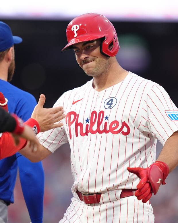Jun 9, 2025; Philadelphia, Pennsylvania, USA; Philadelphia Phillies infielder Otto Kemp (4) reacts after hitting a single agianst the Chicago Cubs in the fifth inning at Citizens Bank Park.
