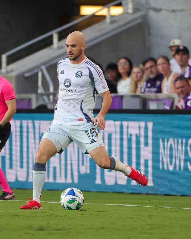 May 31, 2025; Orlando, Florida, USA; Chicago Fire defender Andrew Gutman (15) handles the ball during the first half against Orlando City at Inter&Co Stadium. Mandatory Credit: Mike Watters-Imagn Images