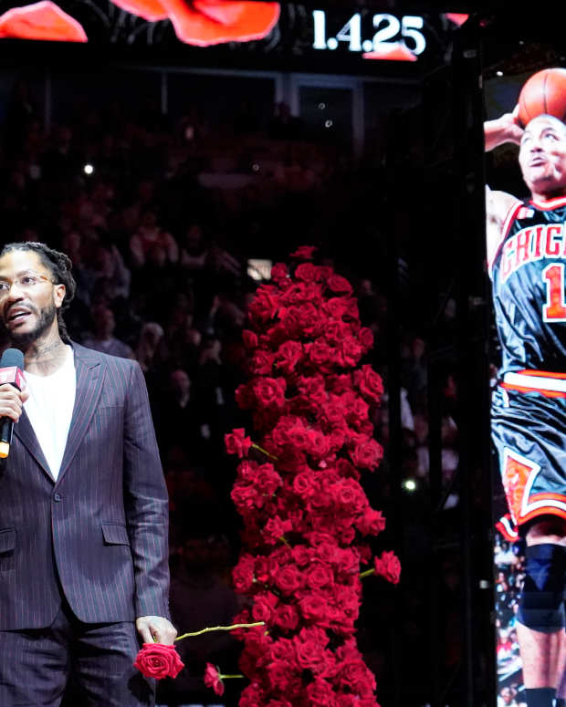 Jan 4, 2025; Chicago, Illinois, USA; Chicago Bulls and New York Knicks former player Derrick Rose speaks as he is honored at halftime of a game between the Chicago Bulls and the New York Knicks at United Center.