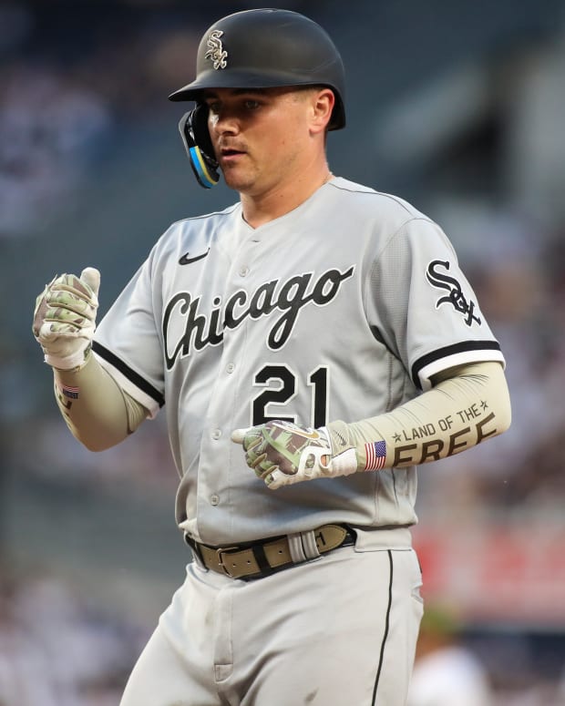 May 22, 2022; Bronx, New York, USA; Chicago White Sox catcher Reese McGuire (21) reaches first base after hitting a single in the third inning against the New York Yankees at Yankee Stadium.