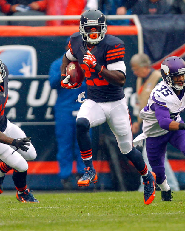 Sep 15, 2013; Chicago, IL, USA; Chicago Bears wide receiver Devin Hester (23) returns a kick during the first quarter against the Minnesota Vikings at Soldier Field. Mandatory Credit: Dennis Wierzbicki-USA TODAY Sports