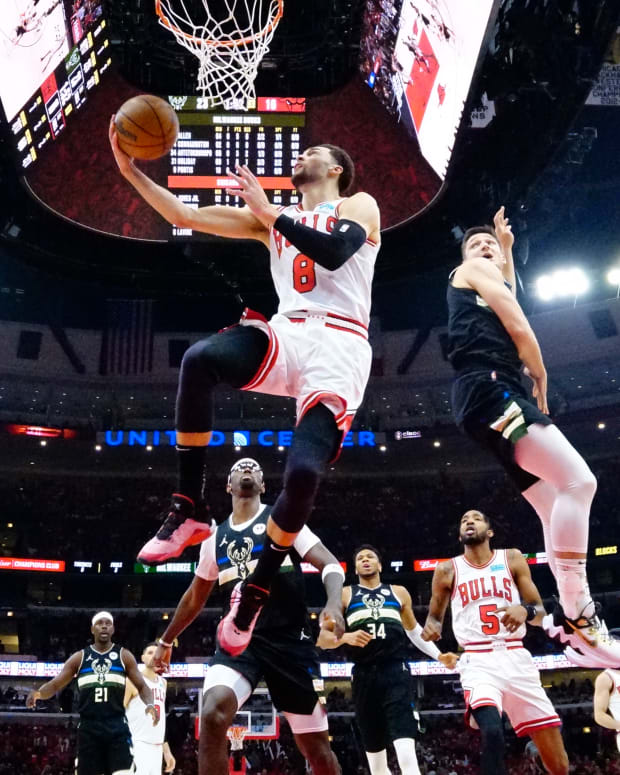 Apr 24, 2022; Chicago, Illinois, USA; Chicago Bulls guard Zach LaVine (8) goes to the basket as Milwaukee Bucks guard Grayson Allen (7) defends him in the first half during game four of the first round for the 2022 NBA playoffs at United Center. Mandatory Credit: David Banks-USA TODAY Sports