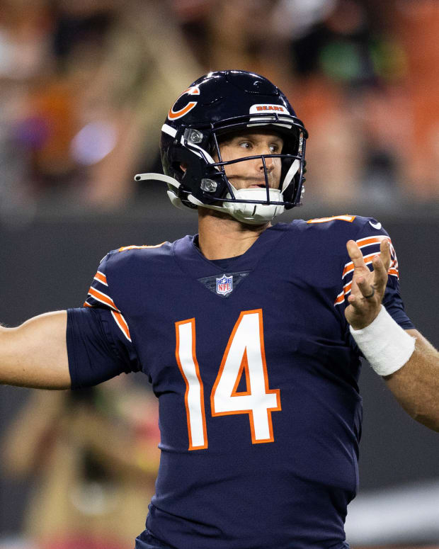 Aug 27, 2022; Cleveland, Ohio, USA; Chicago Bears quarterback Nathan Peterman (14) throws the ball against the Cleveland Browns during the fourth quarter at FirstEnergy Stadium. Mandatory Credit: Scott Galvin-USA TODAY Sports