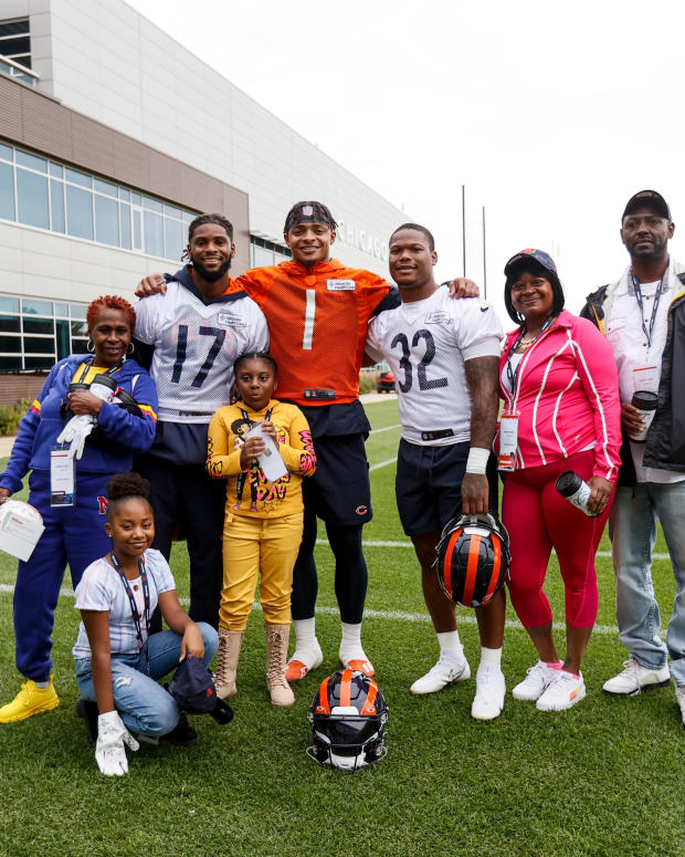 Chicago Bears players Justin Fields, David Montgomery, and Ihmir Smith-Marsette welcome Chanell and her family to Halas Hall for practice and honor her at Soldier Field on Sunday as the Champion of the Game. Photo: BearsOutreach/Twitter