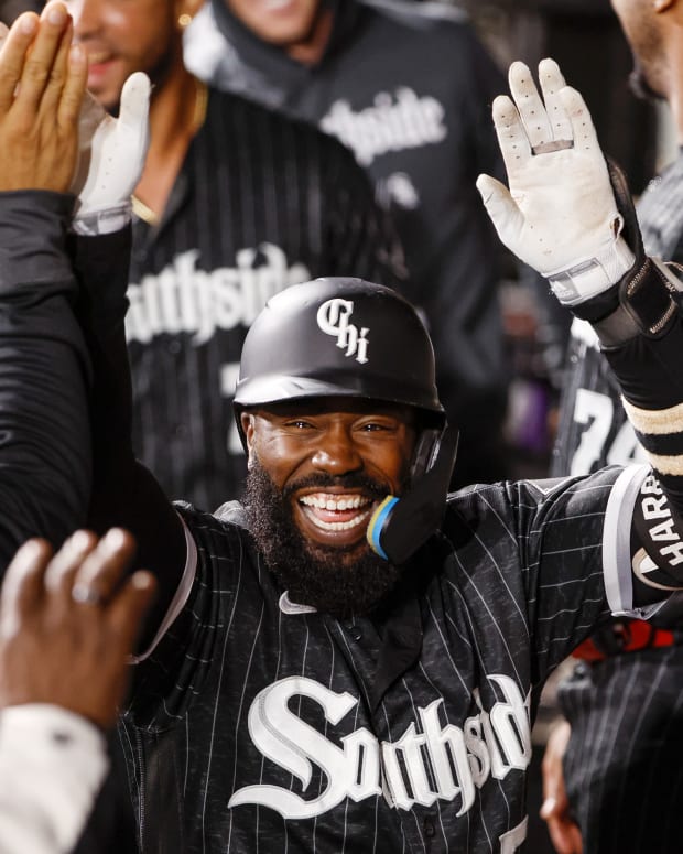 Oct 3, 2022; Chicago, Illinois, USA; Chicago White Sox second baseman Josh Harrison (5) celebrates with teammates after hitting a two-run home run against the Minnesota Twins during the second inning at Guaranteed Rate Field.