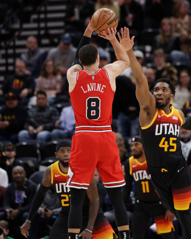 Mar 16, 2022; Salt Lake City, Utah, USA; Chicago Bulls guard Zach LaVine (8) shoots the ball over Utah Jazz guard Donovan Mitchell (45) during the first quarter at Vivint Arena.