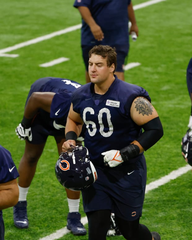 Jun 8, 2022; Lake Forest, IL, USA; Chicago Bears offensive line Dieter Eiselen (60) warms up during organized team activities at Halas Hall. Mandatory Credit: Kamil Krzaczynski-USA TODAY Sports
