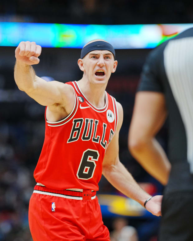 Nov 16, 2022; New Orleans, Louisiana, USA; Chicago Bulls guard Alex Caruso (6) argues with referee Jonathan Sterling (17) against the New Orleans Pelicans during the second quarter at Smoothie King Center.