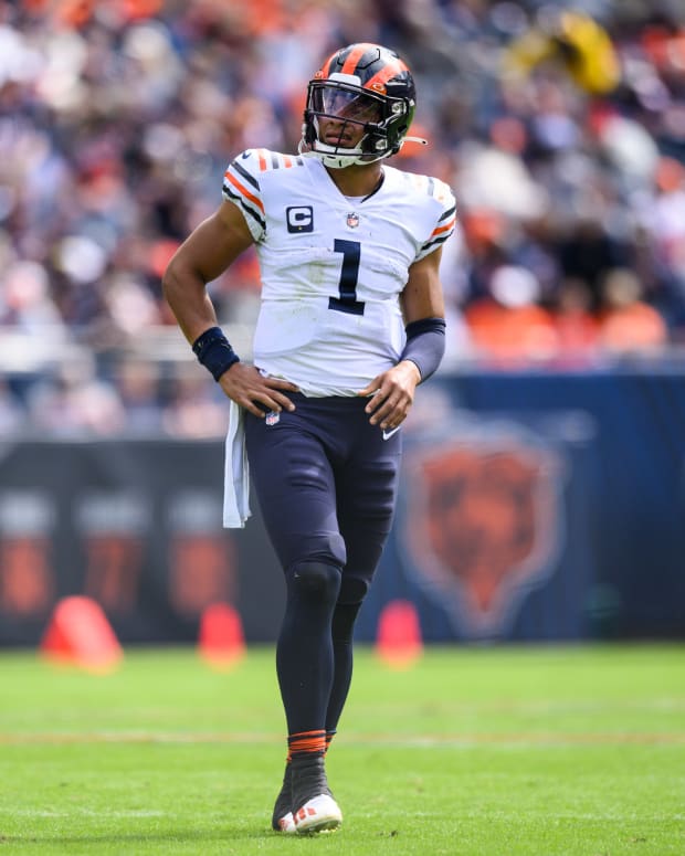 Sep 25, 2022; Chicago, Illinois, USA; Chicago Bears quarterback Justin Fields (1) looks on in the second quarter against the Houston Texans at Soldier Field. Mandatory Credit: Daniel Bartel-USA TODAY Sports
