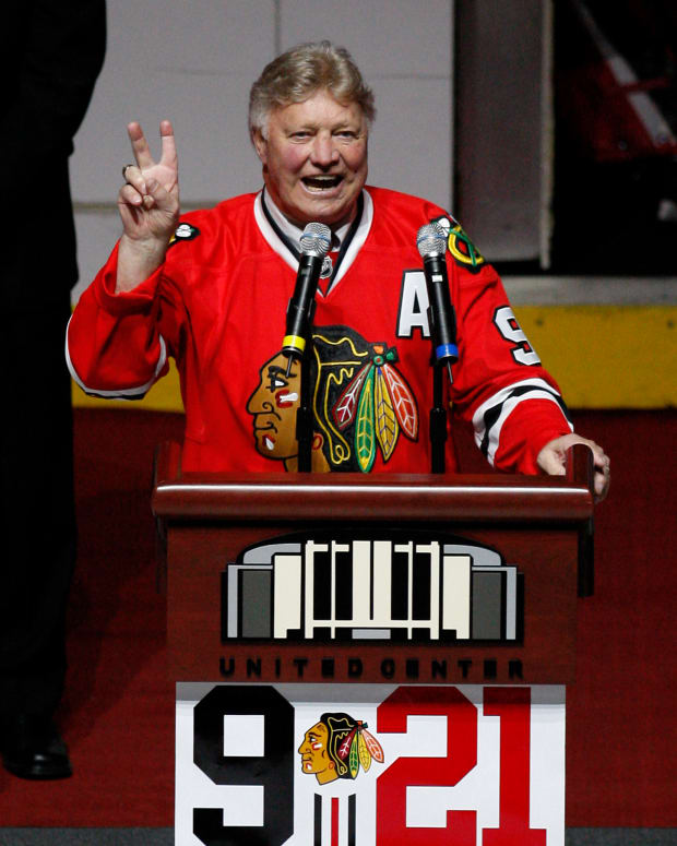 March 7, 2008; Chicago, IL, USA; Chicago Blackhawks former player Bobby Hull (9) speaks during a ceremony honoring his career before the game against the San Jose Sharks at the United Center. The Sharks beat the Blackhawks 3-2.