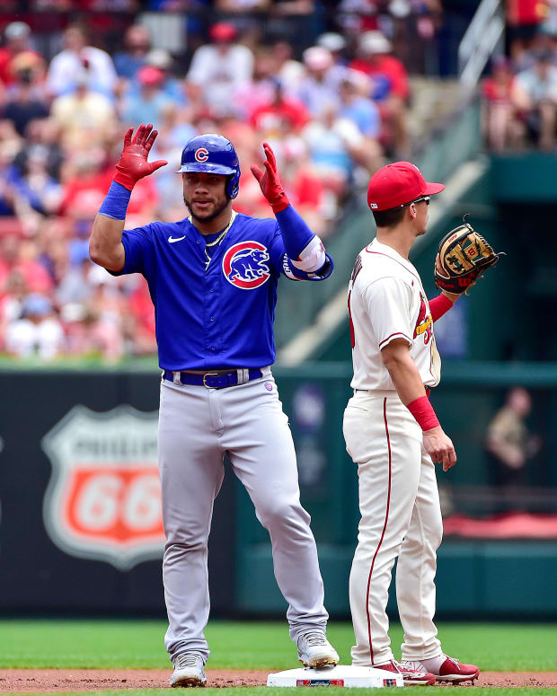 Jun 25, 2022; St. Louis, Missouri, USA; Chicago Cubs catcher Willson Contreras (40) reacts after hitting a double against the St. Louis Cardinals during the first inning at Busch Stadium.