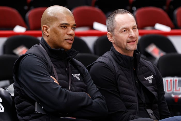 Apr 22, 2022; Chicago, Illinois, USA; Chicago Bulls executive vice president of basketball operations Arturas Karnisovas (right) talks with general manager Marc Eversley (left) before game three of the first round for the 2022 NBA playoffs against the Milwaukee Bucks at United Center.