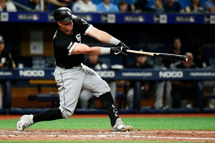 ST. PETERSBURG, FLORIDA - JULY 20: James McCann #33 of the Chicago White Sox hits a home run off of Emilio Pagan #15 of the Tampa Bay Rays in the ninth inning of a baseball game at Tropicana Field on July 20, 2019 in St. Petersburg, Florida. (Photo by Julio Aguilar/Getty Images)
