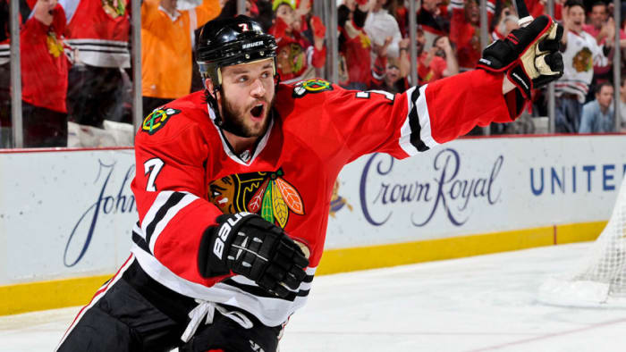CHICAGO, IL - MAY 29: Brent Seabrook #7 of the Chicago Blackhawks reacts after scoring the game-winning goal in overtime against the Detroit Red Wings to take the series in Game Seven of the Western Conference Semifinals during the 2013 Stanley Cup Playoffs at the United Center on May 29, 2013 in Chicago, Illinois. (Photo by Bill Smith/NHLI via Getty Images)