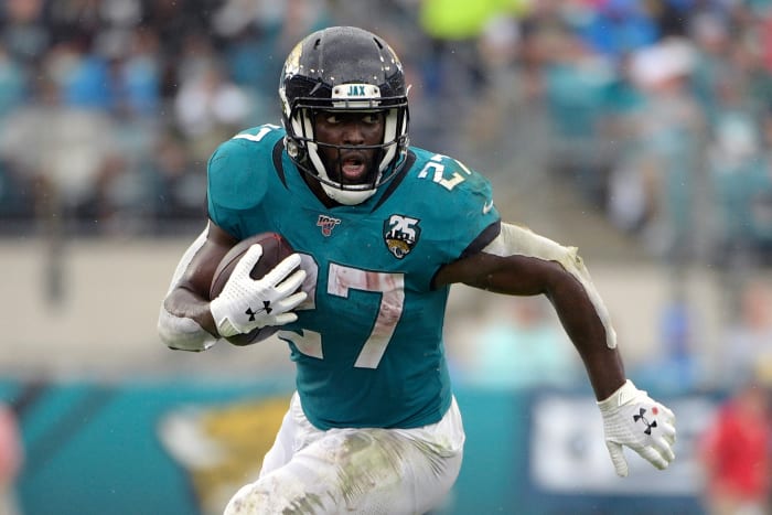 FILE - In this Oct. 27, 2019, file photo, Jacksonville Jaguars running back Leonard Fournette (27) rushes for yardage against the New York Jets during the first half of an NFL football game, in Jacksonville, Fla. Fournette used to be considered a building block in Jacksonville. Then he ended up on the trading block. Now, the bruising running back is entering the final year of his rookie contract and facing an uncertain future with the franchise. (AP Photo/Phelan M. Ebenhack, File)