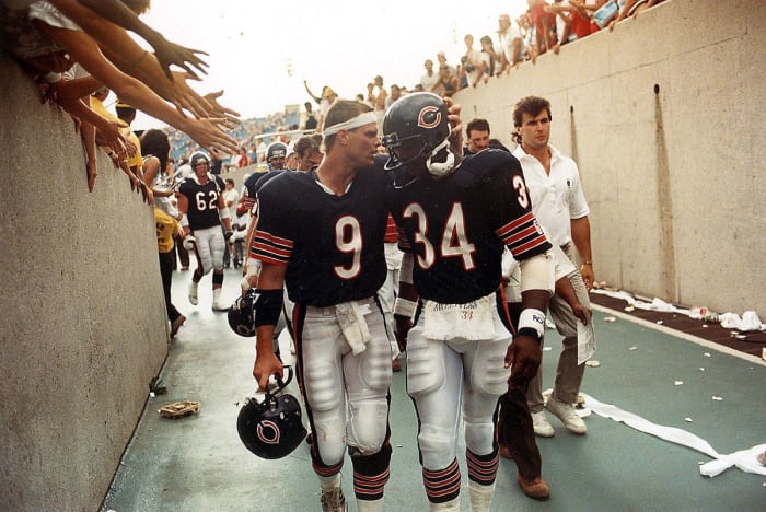 Bears QB Jim McMahon embracing RB Walter Payton after a game.Photo: Charles Cherney/Chicago Tribune via Getty Images