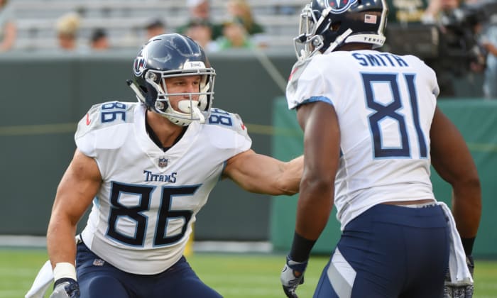 Aug 9, 2018; Green Bay, WI, USA; Tennessee Titans tight end Anthony Firkser (86) warms up with tight end Jonnu Smith (81) before the game against the Green Bay Packers at Lambeau Field. Mandatory Credit: Benny Sieu-USA TODAY Sports