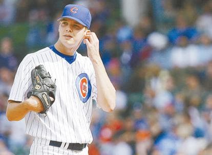 THE ASSOCIATED PRESS Chicago’s Rich Hill pitched shutout ball for seven innings, struck out six and walked one.