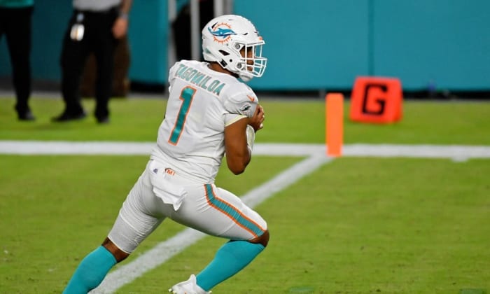 Oct 18, 2020; Miami Gardens, Florida, USA; Miami Dolphins quarterback Tua Tagovailoa (1) drops back during the second half against the New York Jets at Hard Rock Stadium. Mandatory Credit: Jasen Vinlove-USA TODAY Sports
