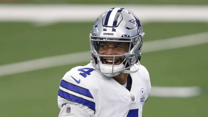 Oct 11, 2020; Arlington, Texas, USA; Dallas Cowboys quarterback Dak Prescott (4) runs on the field before the game against the New York Giants at AT&T Stadium. Mandatory Credit: Tim Heitman-USA TODAY Sports