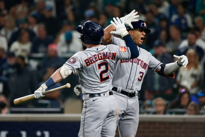 Oct 15, 2022; Seattle, Washington, USA; Houston Astros shortstop Jeremy Pena (3) celebrates with third baseman Alex Bregman (2) after a solo home run in the eighteenth inning against the Seattle Mariners during game three of the ALDS for the 2022 MLB Playoffs at T-Mobile Park.