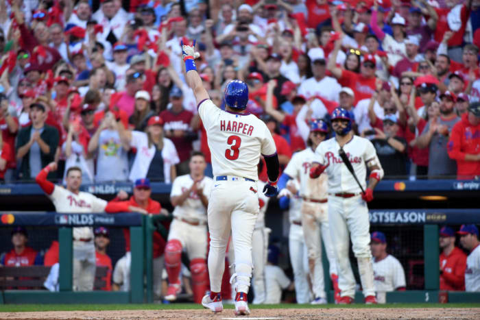 Oct 15, 2022; Philadelphia, Pennsylvania, USA; Philadelphia Phillies designated hitter Bryce Harper (3) gestures after hitting a home run in the eight inning against the Atlanta Braves in game four of the NLDS for the 2022 MLB Playoffs at Citizens Bank Park.