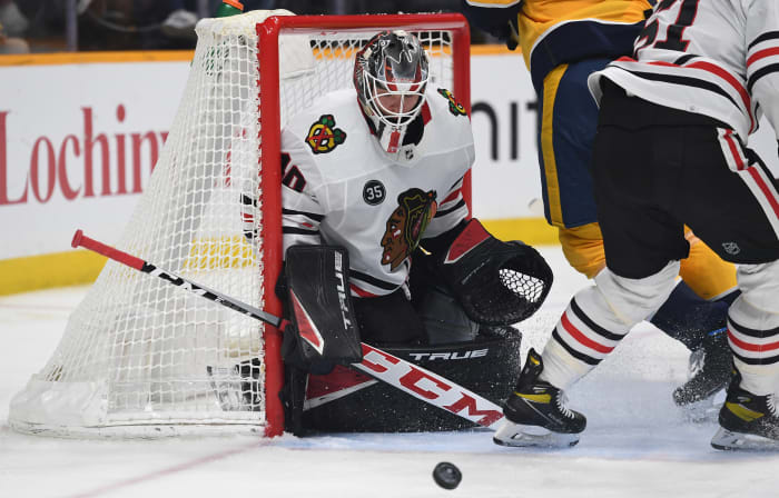 Jan 1, 2022; Nashville, Tennessee, USA; Chicago Blackhawks goaltender Arvid Soderblom (40) makes a save during the third period against the Nashville Predators at Bridgestone Arena.