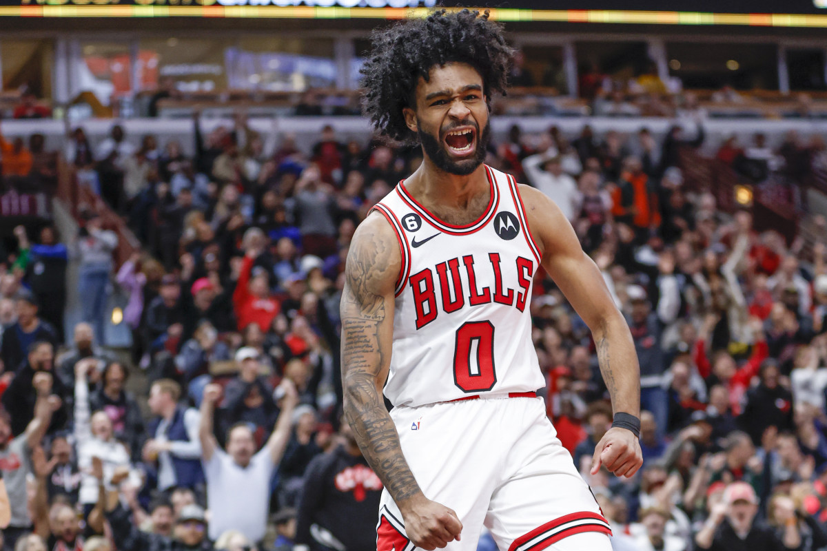 Apr 2, 2023; Chicago, Illinois, USA; Chicago Bulls guard Coby White (0) reacts after scoring against the Memphis Grizzlies during the second half at United Center.