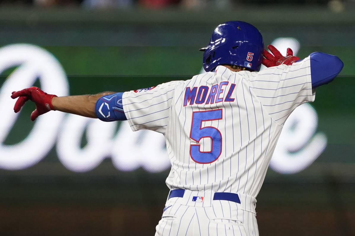 Chicago Cubs designated hitter Christopher Morel, third from right